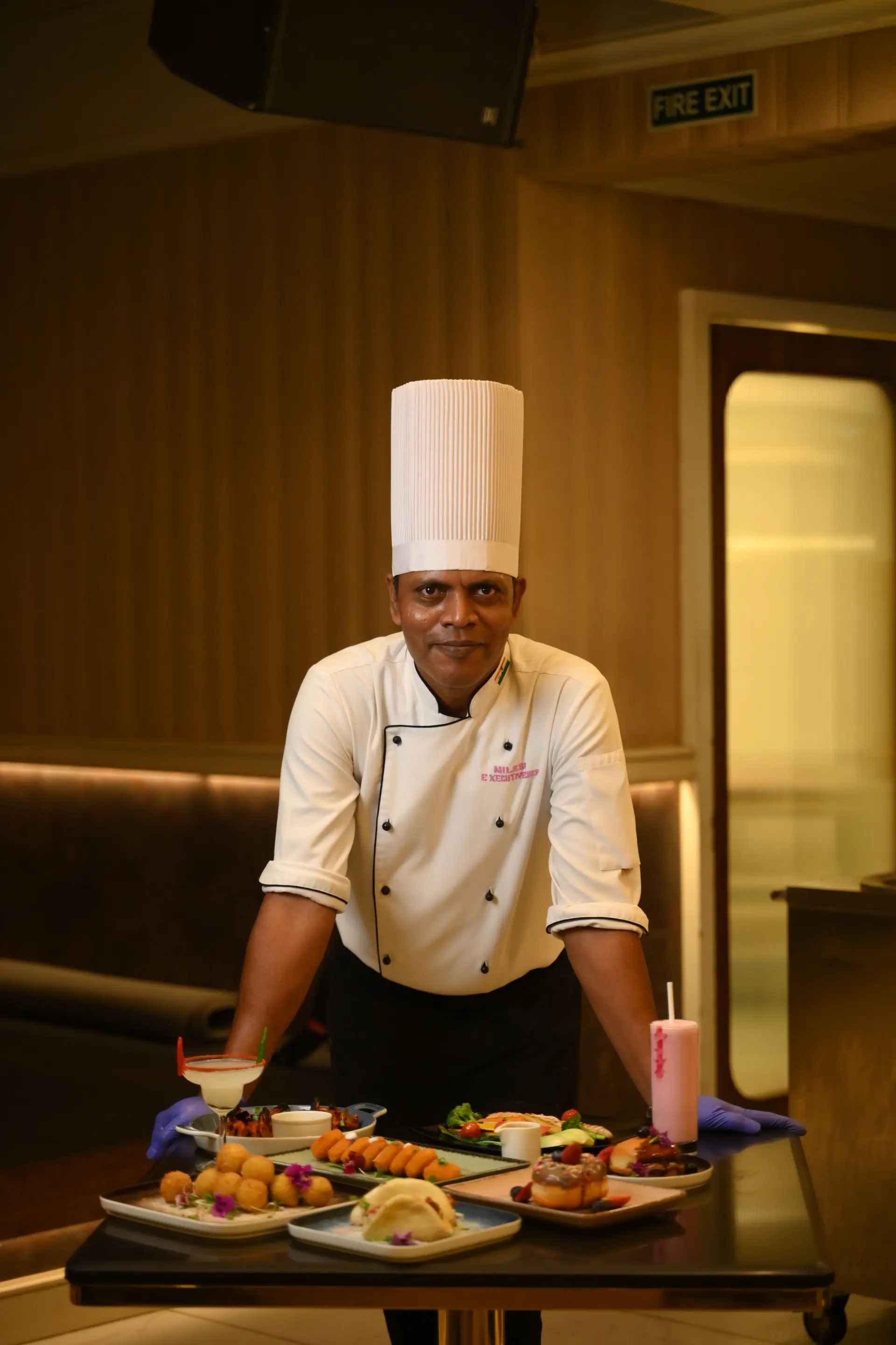 Chef presenting gourmet dish